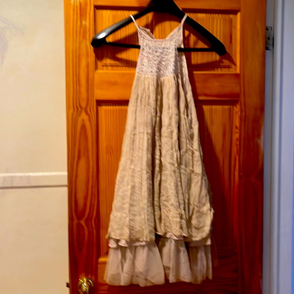 This dress has it is embroidery bottom has a petticoat lace